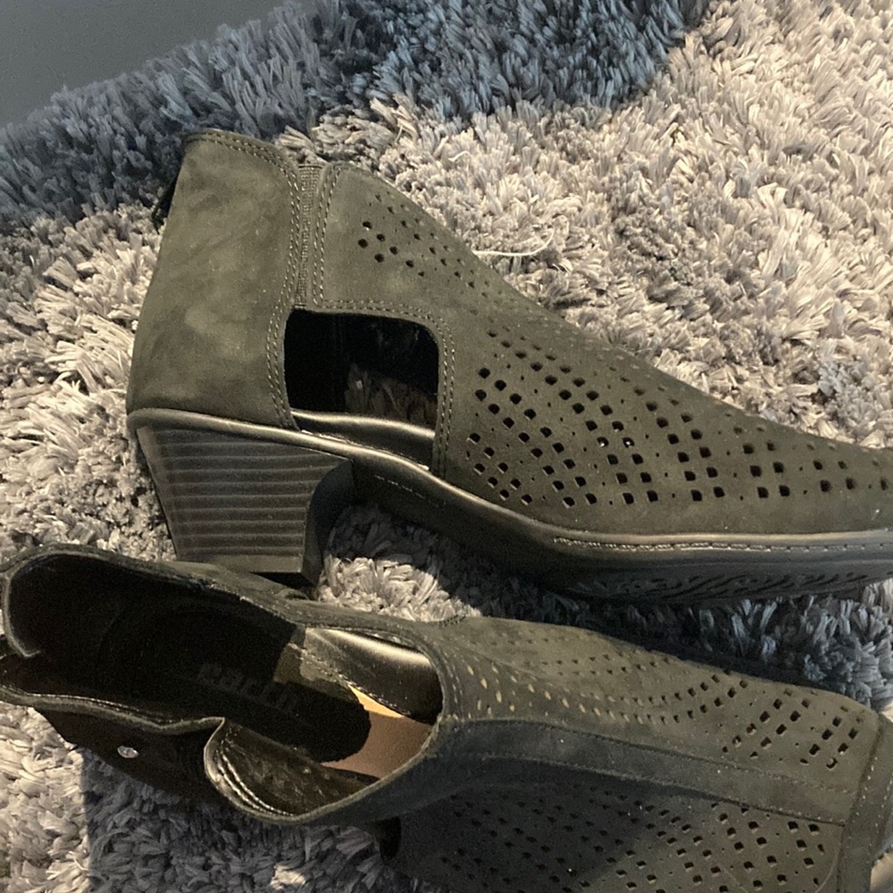 Black suede, back zip, rubber sole, perforated,  peep toe sandals. 1 inch heel.